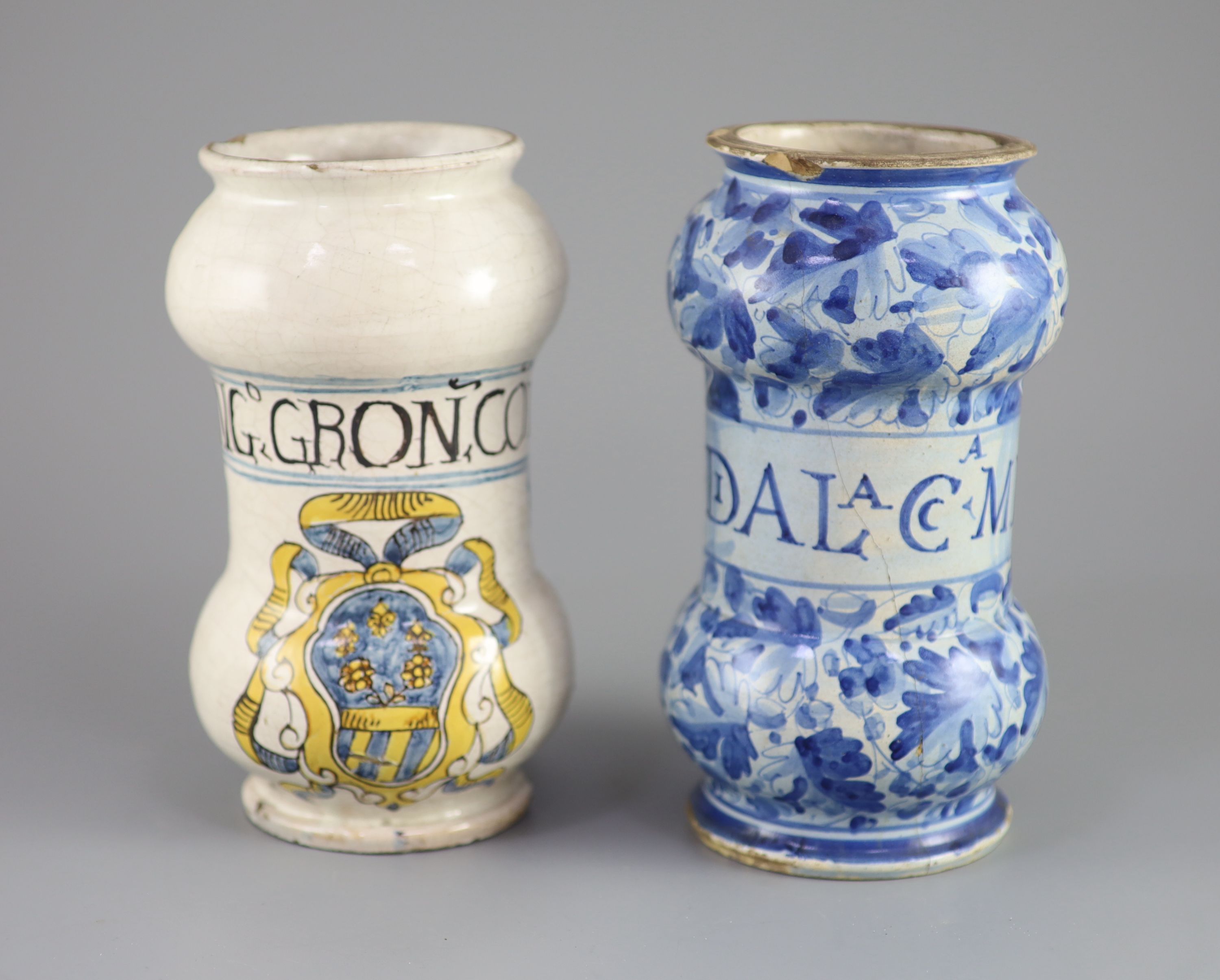 Two Italian maiolica albarello, Savonarola, early 18th century 20cm and 20.5cm high, cracks